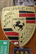***A LARGE ALUMINIUM PORSCHE PLAQUE, H 57 CM, W 46.5 CM