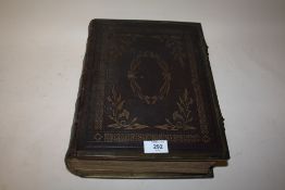 AN ANTIQUE LEATHER BOUND HOLY BIBLE