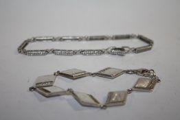 A VINTAGE SILVER MOTHER OF PEARL BRACELET TOGETHER WITH A SILVER TENNIS BRACELET - APPROX 18G