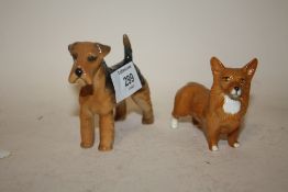 TWO BESWICK DOG FIGURES OF A CORGI AND A HIGHLAND TERRIER