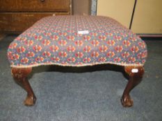 A CABRIOLE LEG SQUARE UPHOLSTERED STOOL