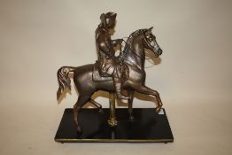 A HEAVY CAST IRON FIGURE OF HORSEBACK - POSSIBLY GEORGE WASHINGTON, mounted on a thick steel base wi