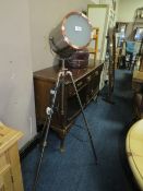A MODERN INDUSTRIAL STYLE TRIPOD FLOORSTANDING LAMP