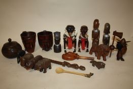 A COLLECTION OF AFRICAN CARVED WOODEN TRIBAL STYLE FIGURES TOGETHER WITH TWO WOODEN FIGURATIVE