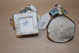 TWO 20TH CENTURY CONTINENTAL CERAMIC FIGURES, one having crossed swords mark to base, tallest H 15.5