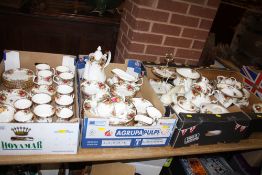 FOUR TRAYS OF ROYAL ALBERT OLD COUNTRY ROSES CHINA TO INCLUDE TEA AND COFFEE POTS, CAKE STAND,