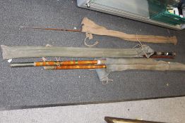 THREE VINTAGE FISHING RODS COMPRISING AN ALCOCK'S WATER WOLF, A SPORTEX EXAMPLE AND A CORK HANDLED
