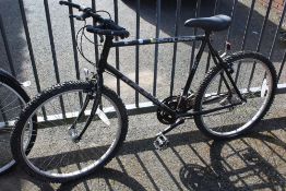 A BLACK RALEIGH BICYCLE