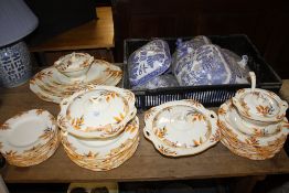 A COLLECTION OF BURLEIGH WARE DINNERWARE TOGETHER WITH A COLLECTION OF BLUE AND WHITE TUREEN LIDS