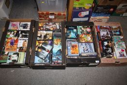FOUR TRAYS OF DVDS