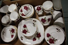 A TRAY OF ROSE PATTERNED CHINA