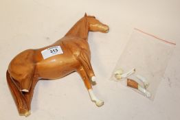 A BESWICK CHESTNUT HORSE FIGURE, A/F, LEGS PRESENT