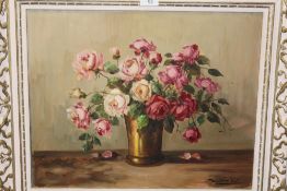 A FRAMED STILL LIFE OIL ON CANVAS STUDY OF ROSES IN A VASE INDISTINCTLY SIGNED LOWER RIGHT SIZE -