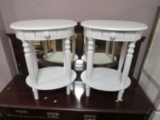 A PAIR OF CONTEMPORARY OVAL CREAM OCCASIONAL TABLES WITH A DRAWER (2)