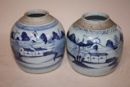 A PAIR OF CHINESE BLUE AND WHITE VASES, decorated with rural scenes, H 16 cm