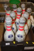 A SET OF TEN W.I.B.C. ABC BOWLING PINS