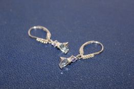 A PAIR OF 9K WHITE GOLD DROP EARRINGS SET WITH AQUAMARINE AND TANZANITE STYLE STONES
