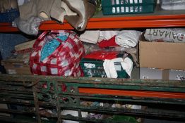 A LARGE QUANTITY OF MOSTLY PACKAGED LADIES CLOTHING, HANDBAGS ETC. (PLASTIC TRAYS NOT INCLUDED)