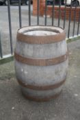 A LARGE METAL BANDED VINTAGE WOODEN BARREL FOR ELEY'S LTD. STAFFORD,, H 52.5 CM