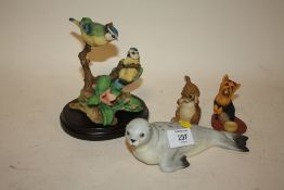 AN AYNSLEY MATT FINISH GREY SEAL FIGURE TOGETHER WITH THREE OTHER AYNSLEY MASTER CRAFT FIGURES