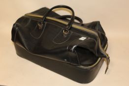 A VINTAGE BLACK LEATHER GLADSTONE BAG