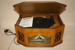 A MODERN STEEPLETONE COMBINATION TURNTABLE/CASSETTE/CD PLAYER