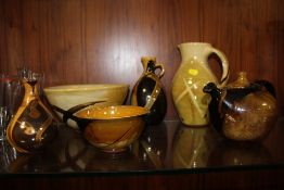A COLLECTION OF BROWN SIGNED STUDIO POTTERY SIGNED CAROLE GLOVER (6)