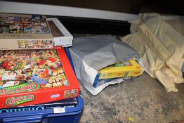 A QUANTITY OF JIGSAW PUZZLES ETC.