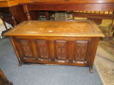 A SMALL OAK GOTHIC STYLE BLANKET BOX H-52 W-107 CM - LOOSE SIDE PANEL