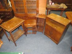 AN OAK NEST OF TABLES, OAK SIDE CABINET, OAK SLIM BOOKCASE AND AN OAK OCCASIONAL TABLE (4)