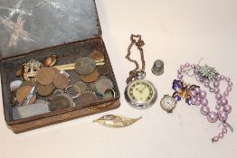 A TIN OF COLLECTABLES TO INCLUDE AN INGERSOLL POCKET WATCH, COINS AND BROOCHES ETC.