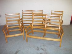 MODERN ERCOL FRAMES - TWO TWO SEATERS AND TWO CHAIRS