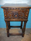 AN ANTIQUE OAK POT CUPBOARD