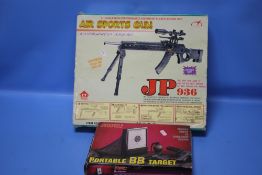 A BOXED AIR SPORT BB GUN AND A BOXED TARGET