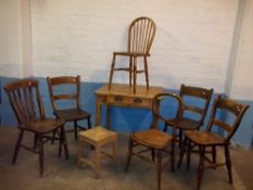 A SCRUB TOP TABLE AND SIX MATCHED CHAIRS