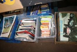 TWO TRAYS OF BOOKS, MAPS, GUIDES ETC. TOGETHER WITH TWO BOXES OF TOYS INCLUDING WADDINGTONS