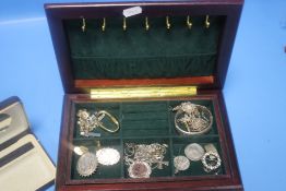 A BOX OF WHITE METAL CHAINS, BROOCHES ETC.