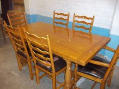 A MODERN WILLIS & GAMBIER OAK EXTENDING DRAWER LEAF TABLE AND SIX CHAIRS A/F
