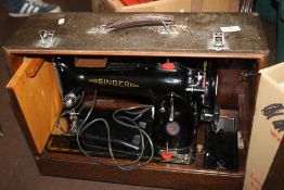 A CASED SINGER SEWING MACHINE