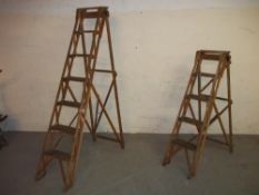 TWO VINTAGE WOODEN STEP LADDERS