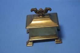 A BRASS TOBACCO BOX