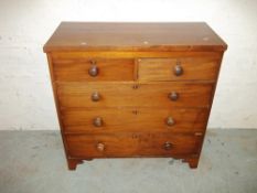 AN ANTIQUE TWO OVER THREE, FIVE DRAWER CHEST