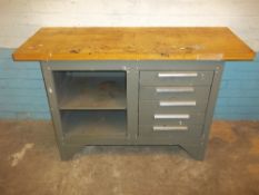 A STEEL WORK BENCH WITH TOOL DRAWERS