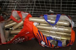 TWO BAGS OF COTTON BOBBINS