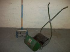 A RANSOME AJAX PUSH MOWER AND A HAND LAWN AERATER