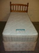 A SINGLE BED WITH A BENSON'S MATTRESS