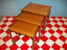 A TEAK RETRO G-PLAN NEST OF THREE TABLES