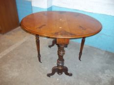 A BURR WALNUT PEMBROKE DROP LEAF TABLE