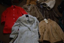 A COLLECTION OF LADIES COATS TO INCLUDE FUR EXAMPLES