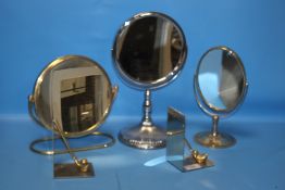 THREE METAL FRAMED MIRRORS AND A PAIR OF GOLFING BOOKENDS